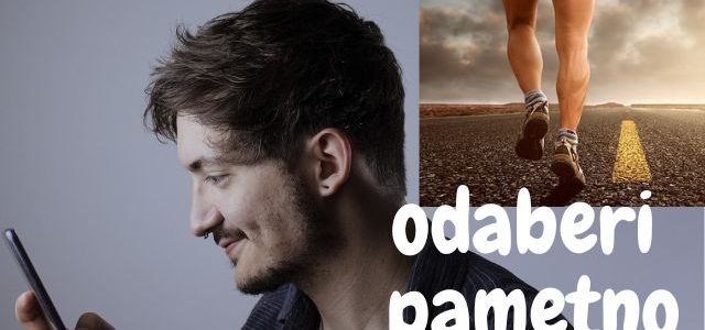 čovjek gleda na mobitel i osoba koja trči